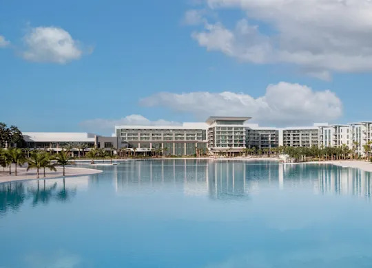 Conrad Orlando hotel with a large pool in front.