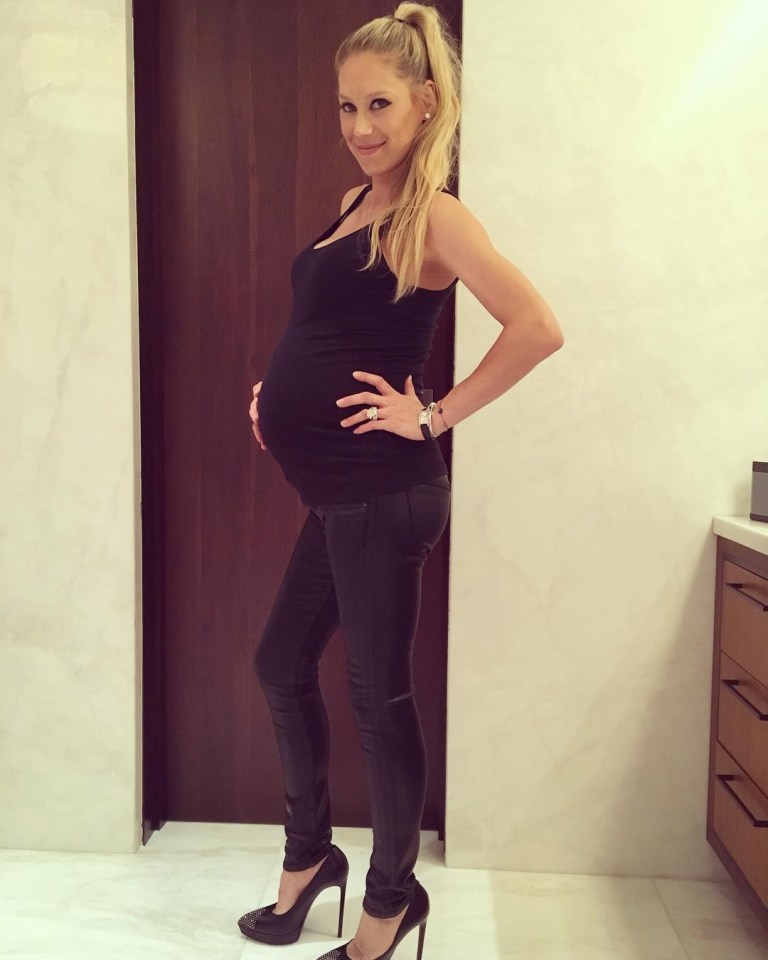 Anna Kournikova, pregnant, in profile.