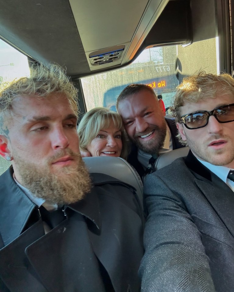 Jake Paul, Conor McGregor, Logan Paul, and a woman in a car.