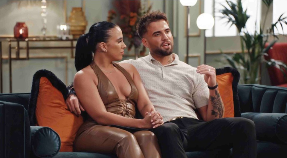 Lacey and Nathan from Married at First Sight UK on a couch.
