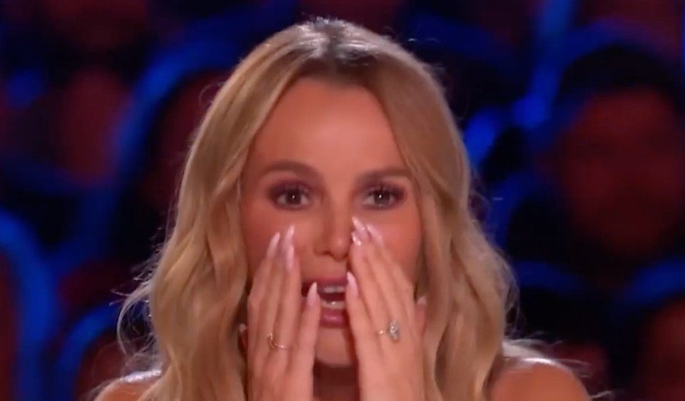Screenshot of a woman reacting with surprise and tears on Britain's Got Talent.