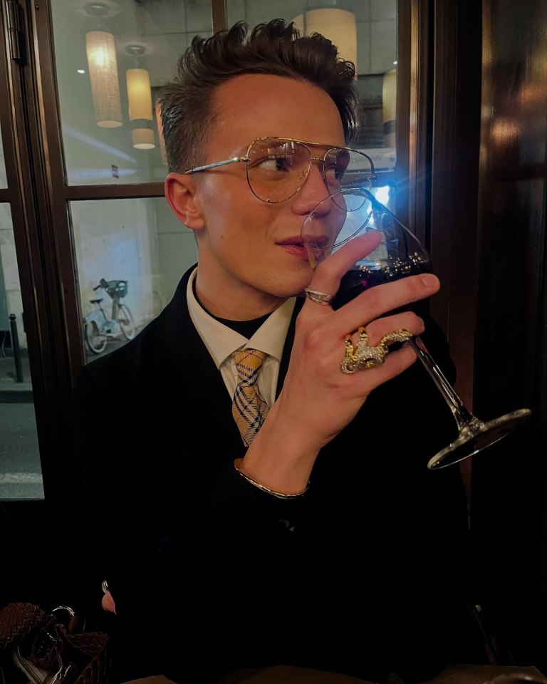 Ronan Parke drinking wine.