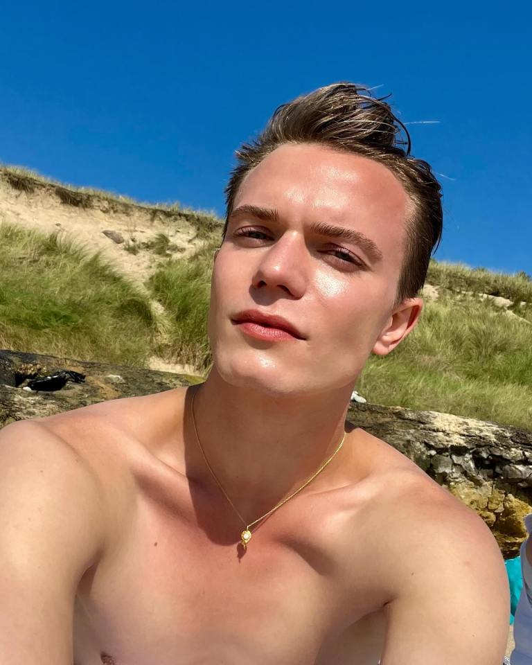 Close-up of a young man at the beach.