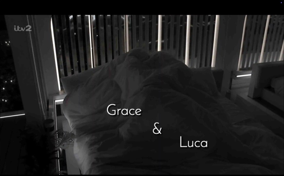 Grace and Luca sleeping under covers.