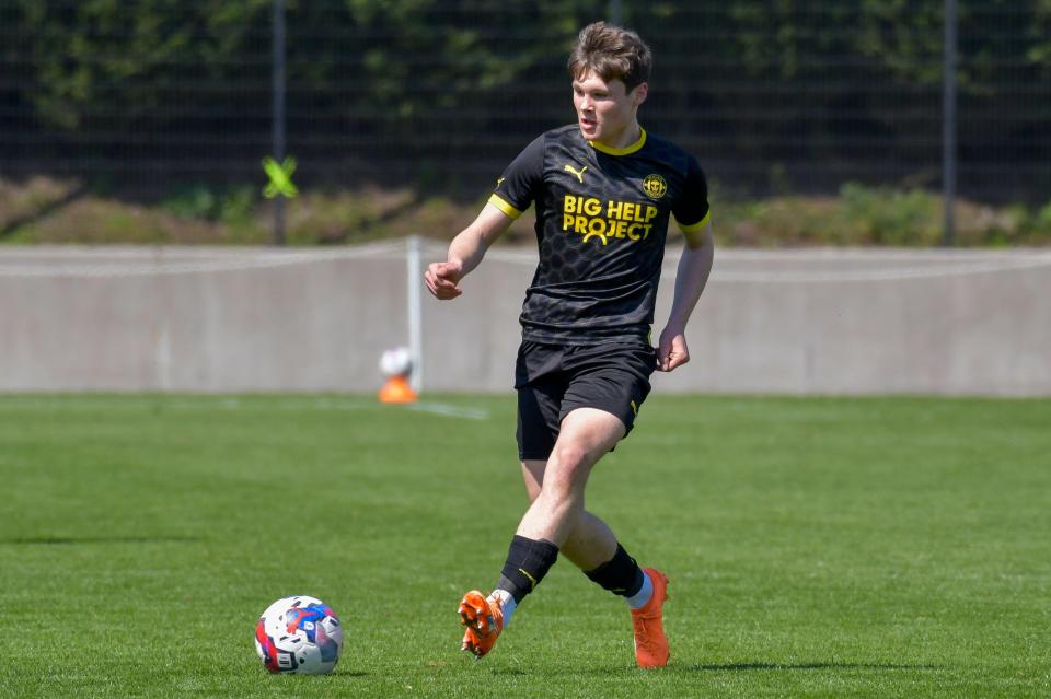 Harrison Rimmer of Wigan Athletic playing soccer.