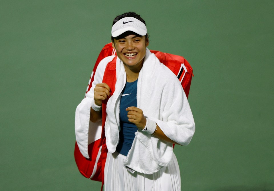 Emma Raducanu celebrating a tennis match victory.