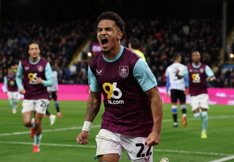 Burnley's Marcus Edwards celebrates scoring a goal.