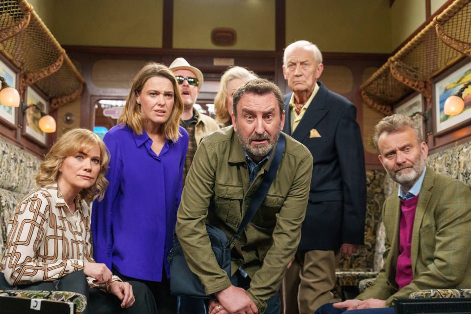 Cast of Not Going Out on a train.
