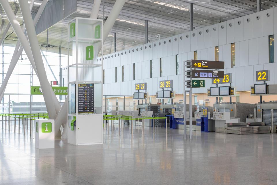 Empty airport check-in counters.