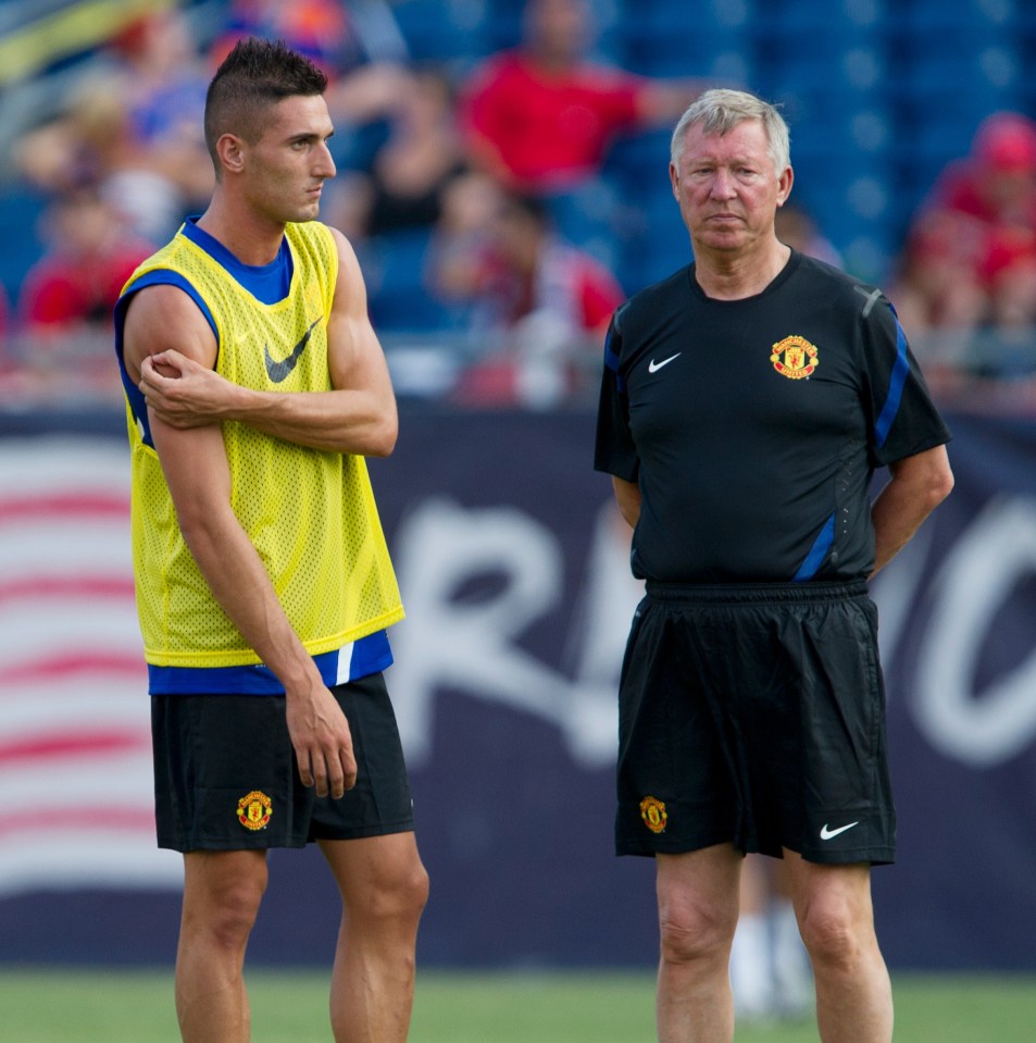 Manchester United's Federico Macheda and Sir Alex Ferguson at training.
