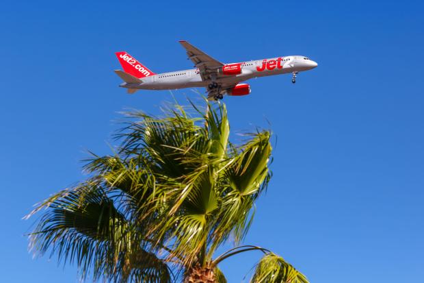 Jet2 Boeing 757-200 airplane landing at Tenerife South airport.