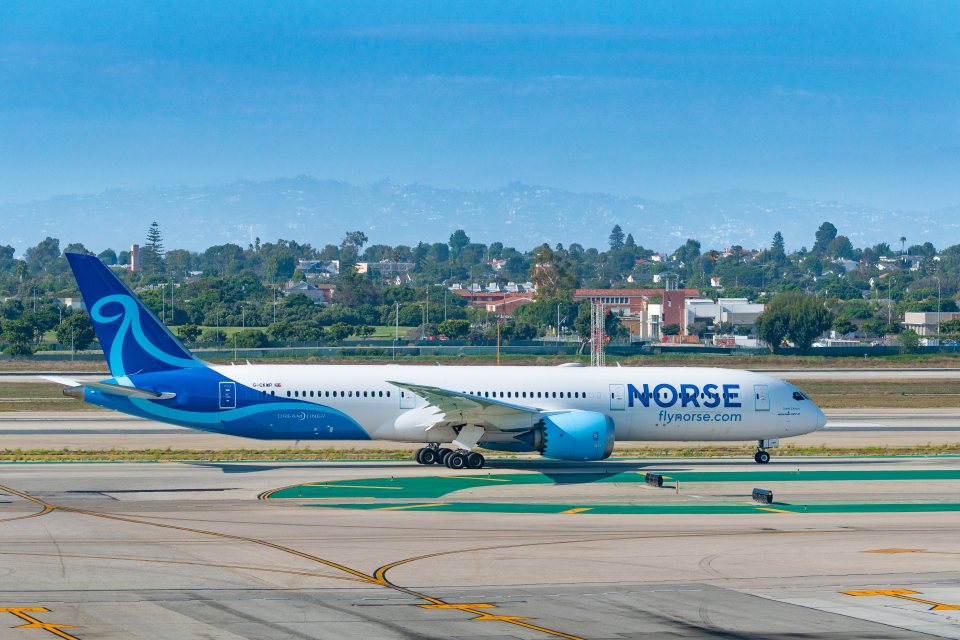 Norse Atlantic Airways Boeing 787-9 Dreamliner preparing for takeoff at an airport.