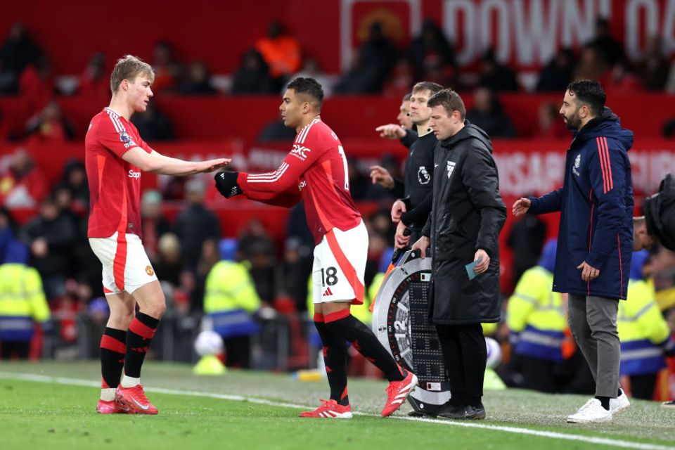 MANCHESTER, ENGLAND - FEBRUARY 26: Rasmus Hojlund of Manchester United high fives teammate Casemiro of Manchester United, as he leaves the pitch during the Premier League match between Manchester United FC and Ipswich Town FC at Old Trafford on February 26, 2025 in Manchester, England. (Photo by Alex Livesey/Getty Images)