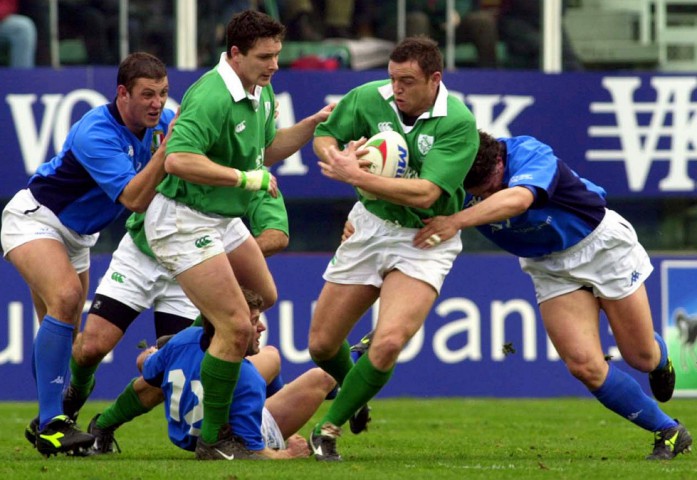 From left, Italy's David Dal Maso, Ireland Tyron Howe, Italy's Giovanni Raineri, at ground, Ireland's Rob Henderson and Italy's Mauro Bergamasco in action during the Six Nations Championships' rugby match between Ireland and Italy at Rome's Flaminio stadium, Saturday Feb. 3, 2001. Ireland beat Italy 41-22. (AP Photo/Maurizio Spreafico)