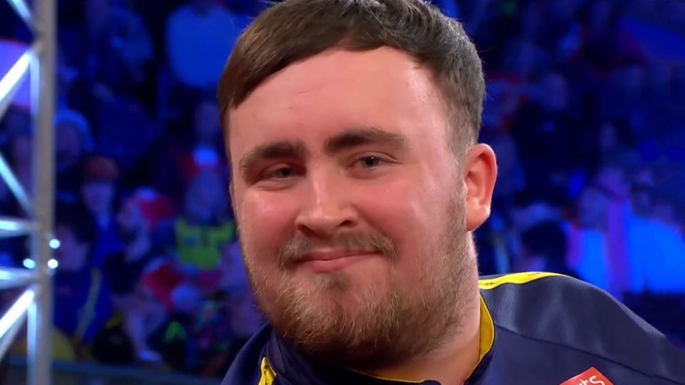 Close-up of a man smiling.