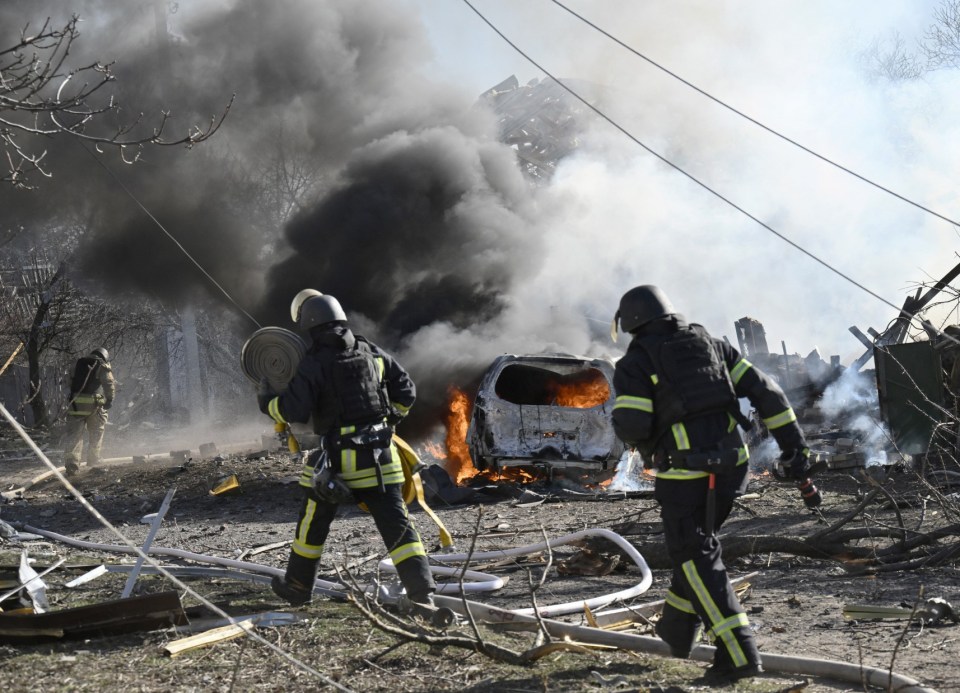 Ukrainian firefighters work at the site of a strike in the city of Kramatorsk on February 13, 2025, amid the Russian invasion of Ukraine. At least one person was killed and 5 injured in the strike on a residential area of Kramatorsk. According to preliminary information, the Russians dropped 2 FAB-250 bombs on the city. A 46-year-old man died from his wounds, and among the wounded was a 16-year-old girl. Two houses and several cars were damaged, according to the Donetsk Regional State Administration Telegram channel. (Photo by Genya SAVILOV / AFP) (Photo by GENYA SAVILOV/AFP via Getty Images)
