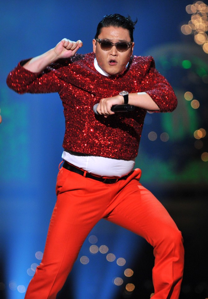 Psy performing on stage.