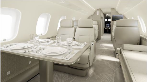 Interior of a Global 6500 private jet showing a dining table and seating.