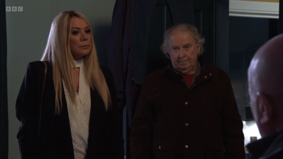 Screenshot of a scene with three people.