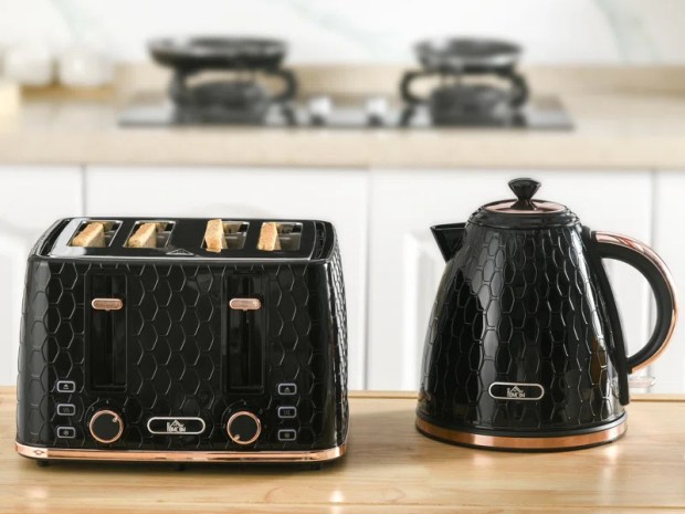 Black kettle and toaster set with rose gold accents.