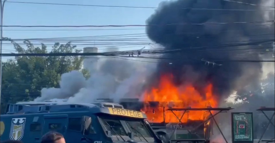 A plane crash in São Paulo, Brazil, resulting in a burning bus.