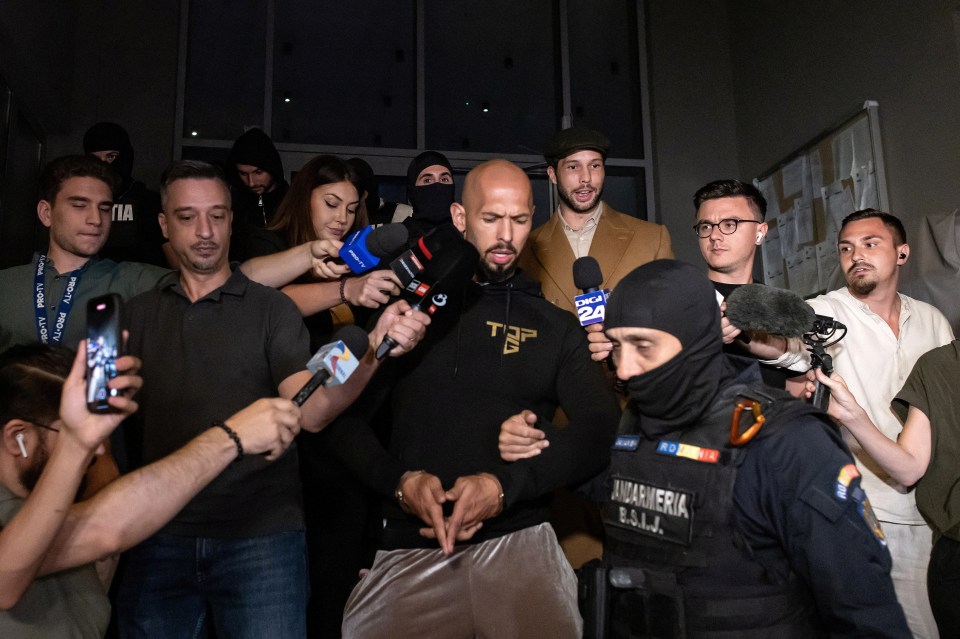 Andrew Tate and his brother Tristan surrounded by reporters and police.
