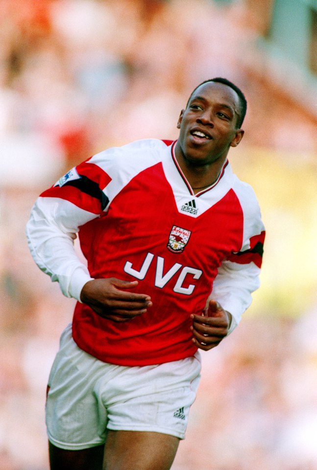 Ian Wright of Arsenal playing football.