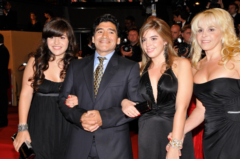 Diego Maradona with his wife and two daughters at a film premiere.