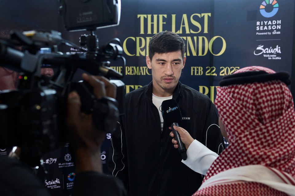 Dmitry Bivol at a media event.
