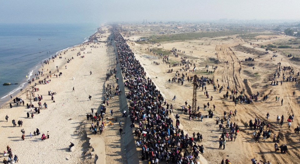 Aerial view of Palestinians returning to their homes in Gaza after a ceasefire.