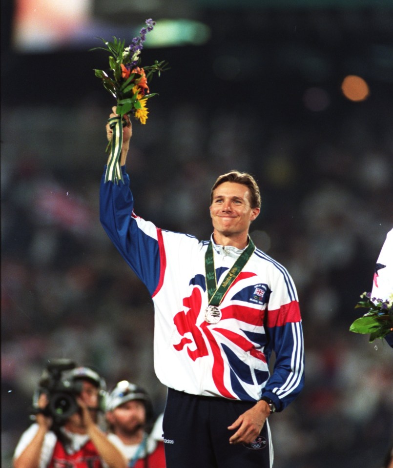 Roger Black of Great Britain accepting his silver medal at the 1996 Atlanta Olympics.