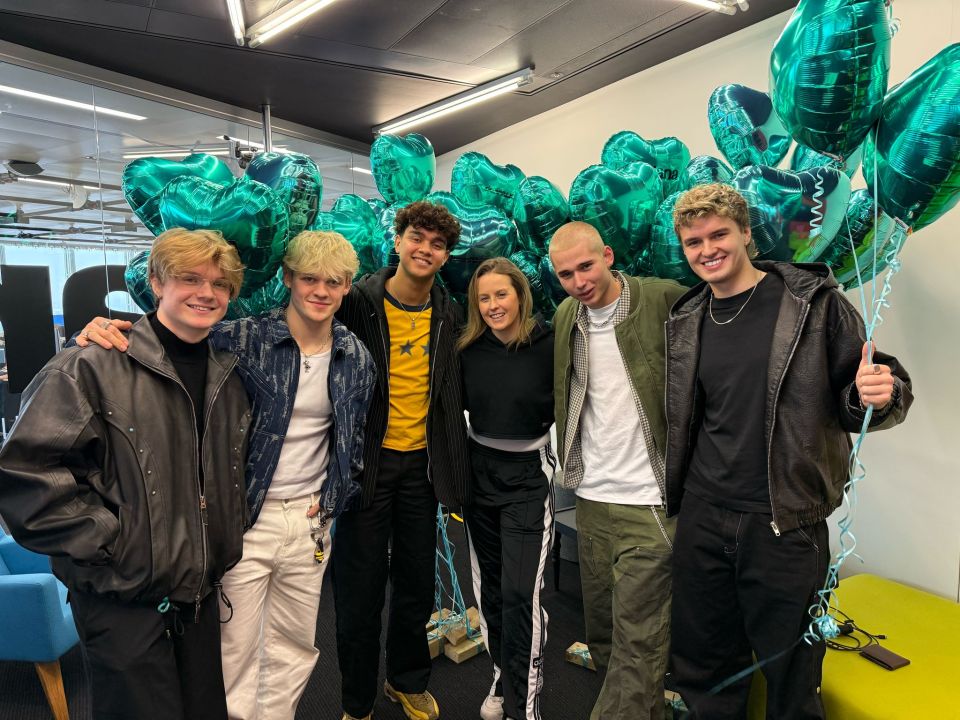 Ellie Henman with the British boyband Dear Alice.
