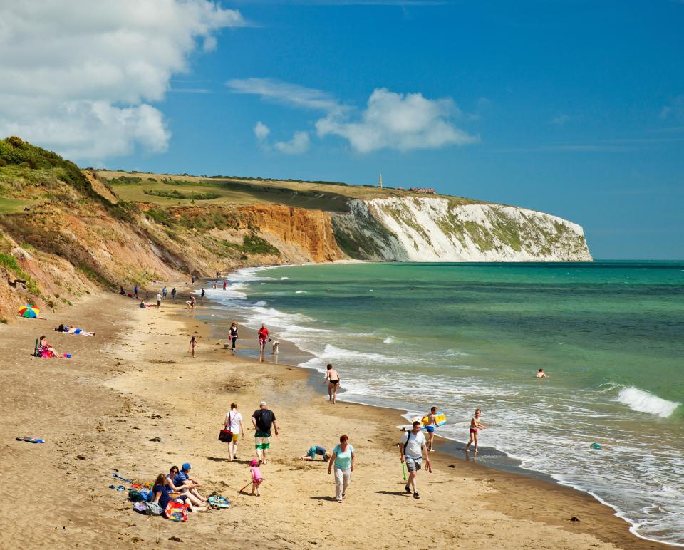 People enjoying Yaverland beach on the Isle of Wight.