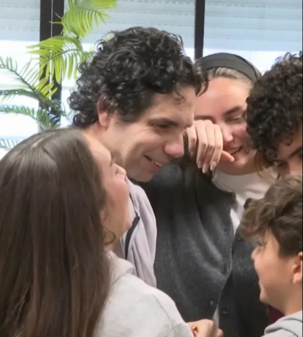 Released hostages reuniting with family.