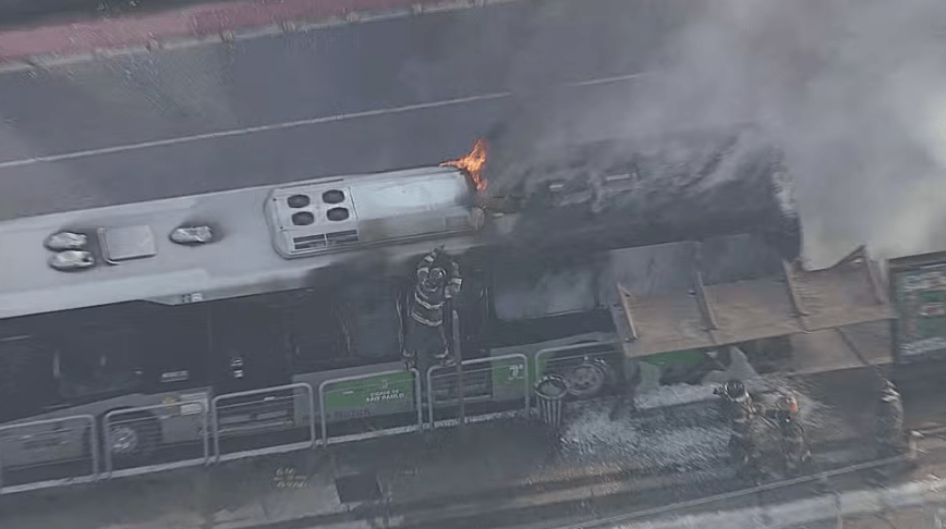 Burning bus after plane crash.