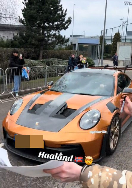 Erling Haaland's orange Porsche.