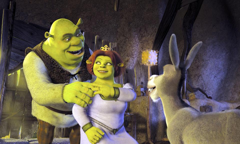 Shrek, Donkey, and Princess Fiona in a scene from Shrek.