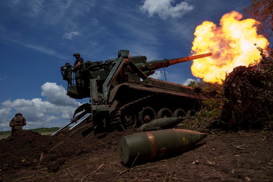 Military artillery firing.