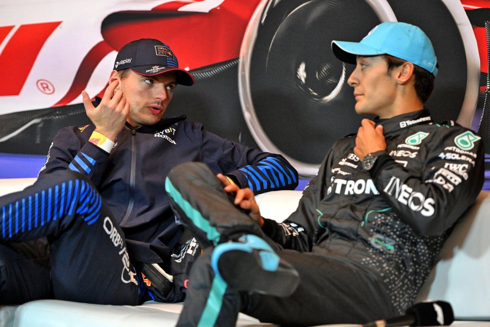 Max Verstappen and George Russell at a Formula 1 press conference.