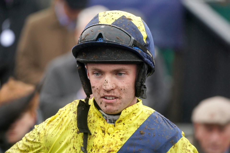Mud-splattered jockey Michael O'Sullivan after a race win.