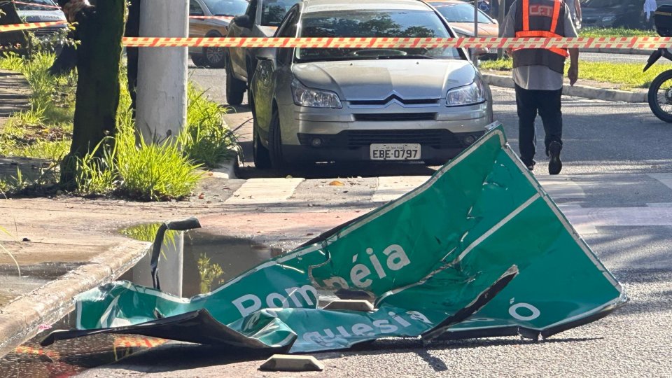 Damaged street sign after a plane crash.