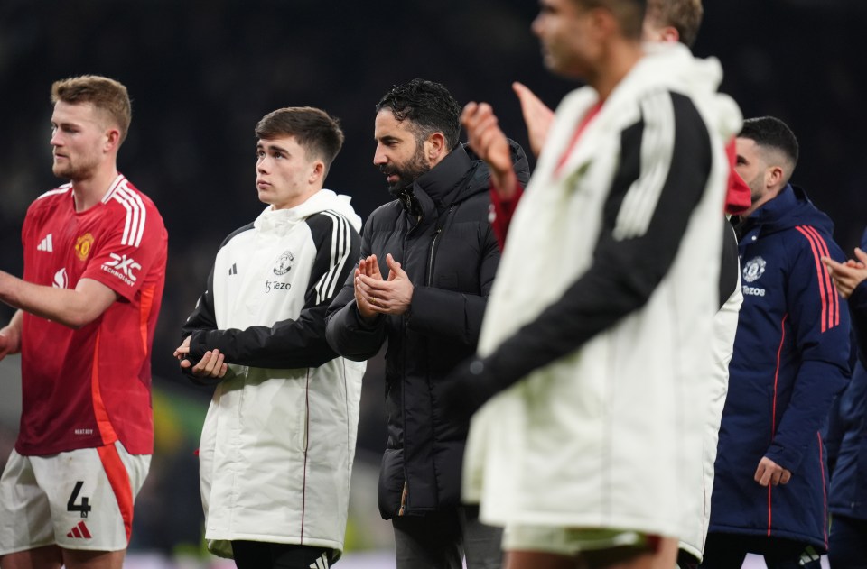 Manchester United manager Ruben Amorim with players after a Premier League match.