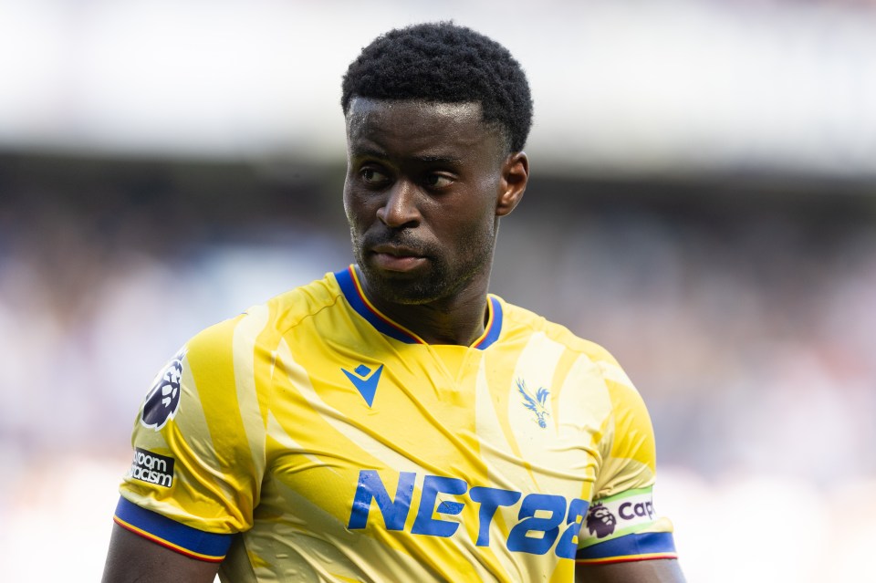 Marc Guéhi of Crystal Palace in a yellow jersey.
