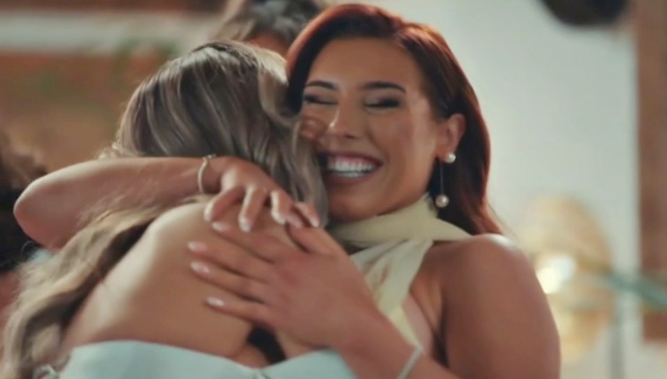 Erica Roberts hugging a woman at the Married at First Sight reunion.