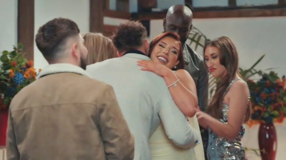 Erica Roberts hugging a man at the Married at First Sight reunion.
