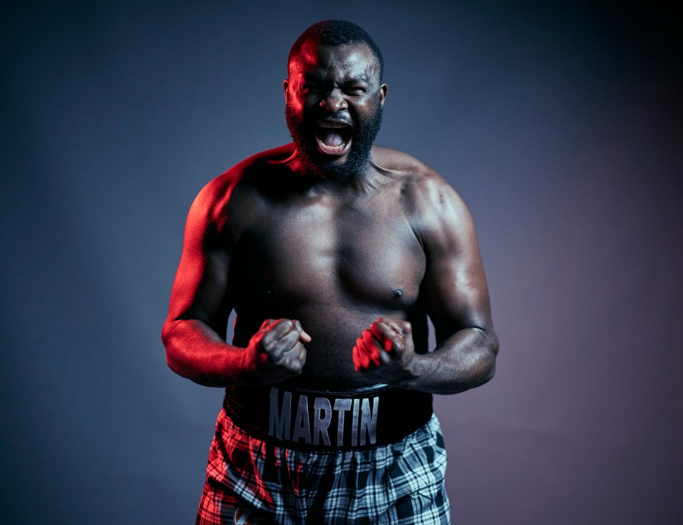 Studio portrait of boxer Martin Bakole.