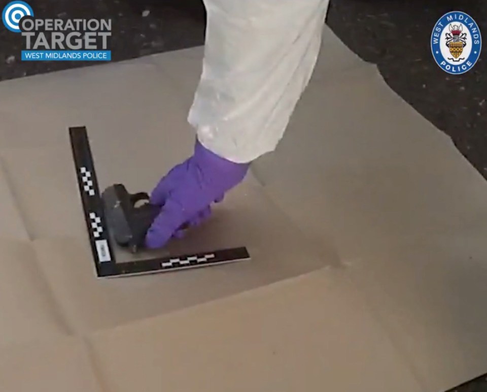Forensic officer collecting a handgun with a scale.