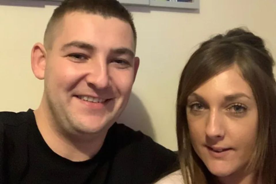 Photo of a smiling couple.