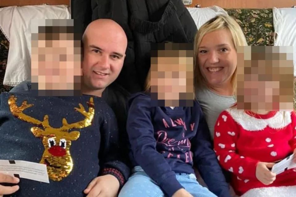 Family photo with faces blurred.