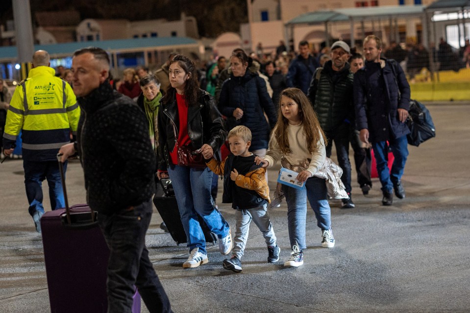 People boarding a ferry in Piraeus.